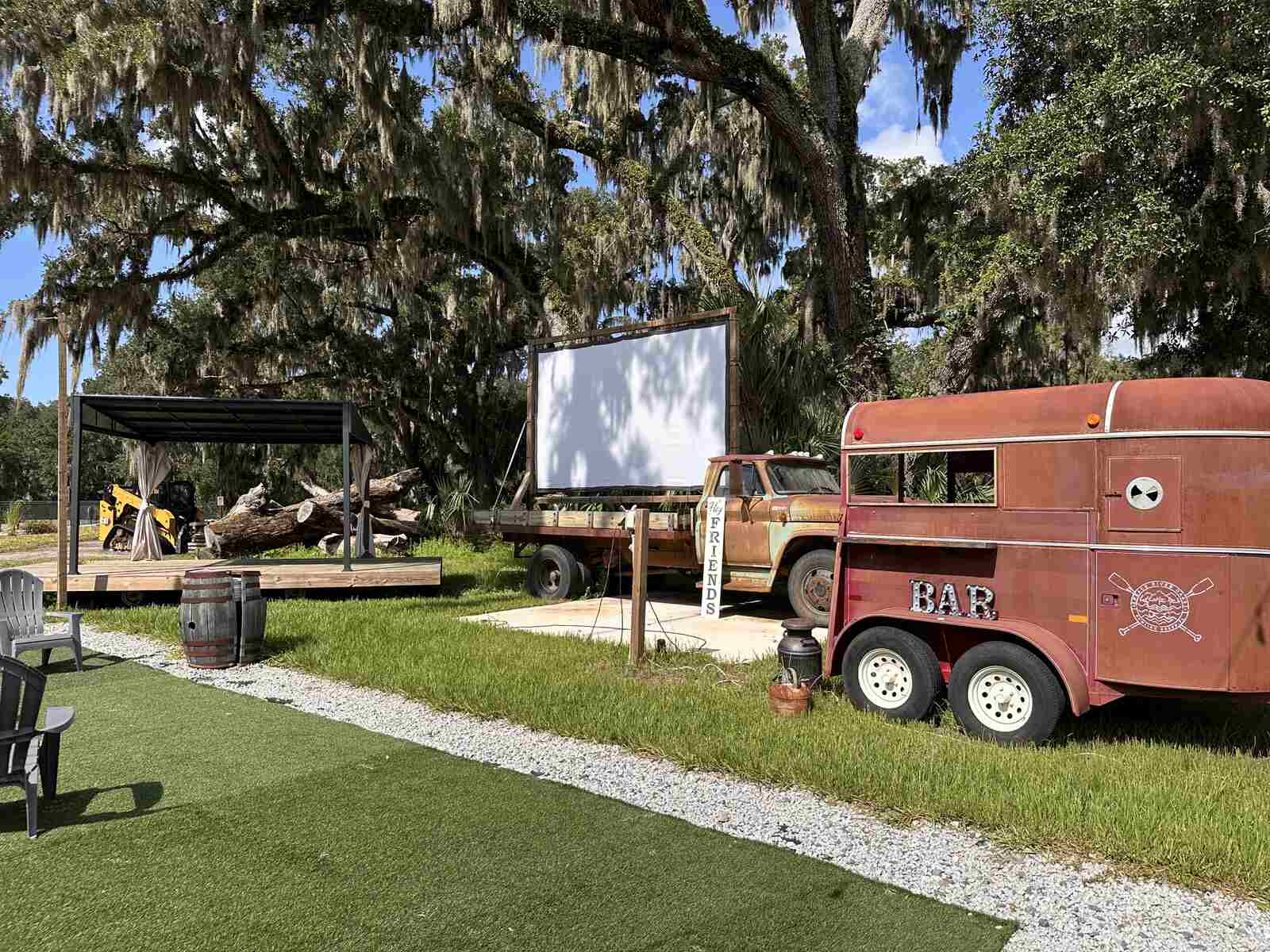 The converted horse-trailer bar beside the movie screen at Peace River Oaks, Bowling Green, Florida