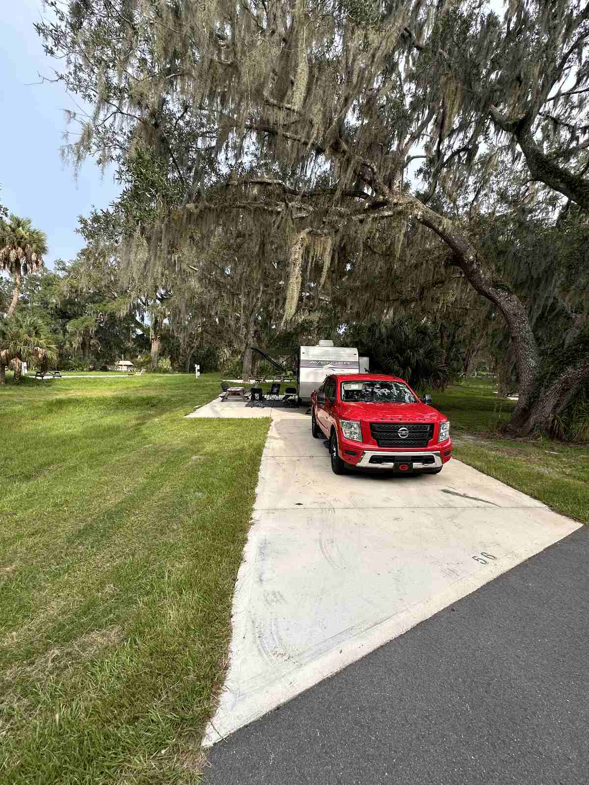 The concrete pad and driveway on site 56 at Peace River Oaks, Bowling Green, Florida